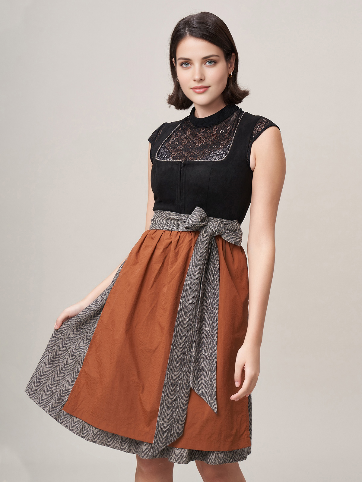 Modernes Dirndl mit hochgeschlossener Bluse
